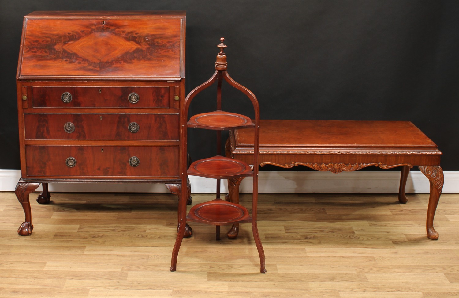 A mahogany bureau, fall front enclosing a fitted interior above three long drawers, 101cm high, 82cm