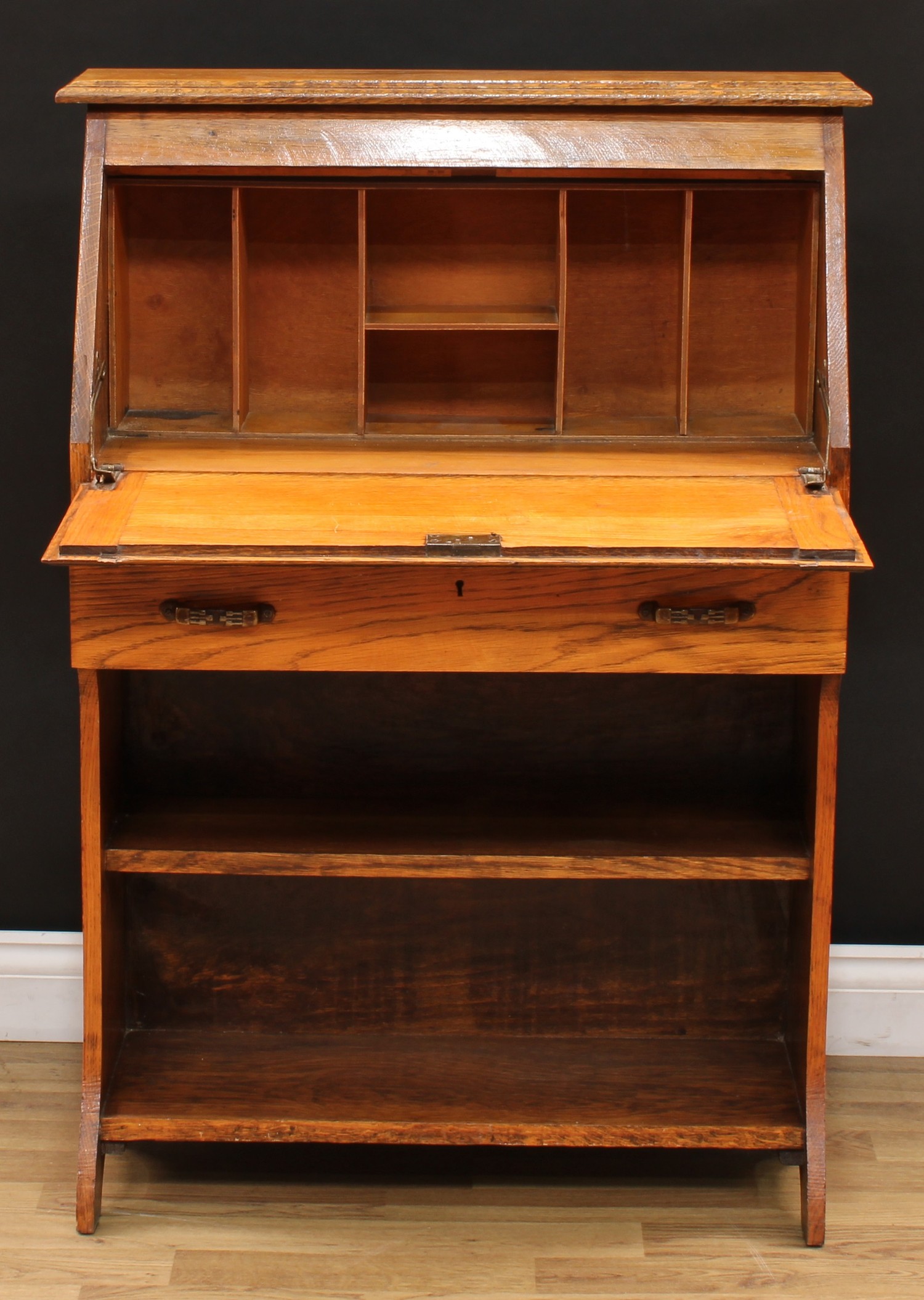 An early 20th century oak student's bureau, fall front enclosing an arrangement of pigeonholes, - Image 2 of 4