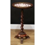 A Grand Tour style rosewood occasional table, the glazed circular top enclosing an arrangement of