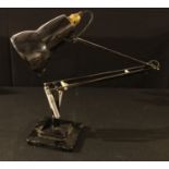 A mid 20th century Herbert Terry & Sons Anglepoise lamp, black with two step base
