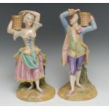 A pair of Royal Worcester figural candlesticks, of a gentleman and lady, both in 18th century dress,