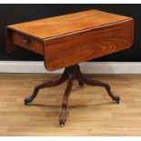 An unusual Regency mahogany pembroke table, possibly Scottish, rounded rectangular top with fall