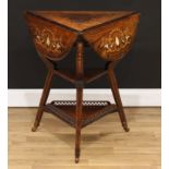 A Sheraton Revival rosewood and marquetry centre table, shaped circular top with fall leaves, inlaid