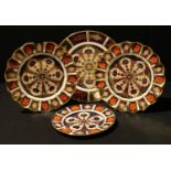 A Royal Crown Derby Imari palette 1128 pattern bread and butter plate, 25cm, second; an 1128 pattern