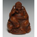 A Chinese bamboo figure, carved as a rotund elder, 13cm high