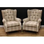A pair of Marks & Spencer Highland button back wingback armchairs, each 102cm high, 82cm wide, the