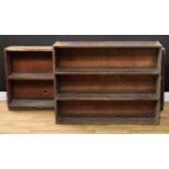 A mahogany shop fitting or bookcase, 74cm high, 182.5cm wide, 24cm deep; a set of pine shelves, 84cm