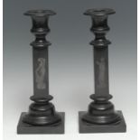 A pair of 19th century black marble candlesticks, possibly Derbyshire Ashford, campana sconces,