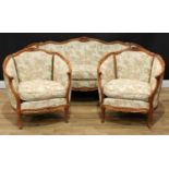 A Louis XV style three piece drawing room suite, comprising sofa and a pair of tub chairs, stuffed-