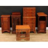 An Edwardian mahogany bedroom cupboard; others similar; a bow front chest of seven drawers, 109cm