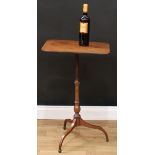 A 'George III' mahogany tripod wine table, rounded rectangular top, slender turned pillar, downswept