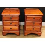 A pair of Ducal pine bedside chests, each, 63.5cm high, 46.5cm wide, 45.5cm deep (2)