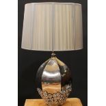 Interior Design - a contemporary hexagonal ovoid table lamp, silver glaze, the base applied in