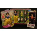 A Disney Snow White and the seven dwarves set, boxed; another Snow White doll, boxed; a Spice