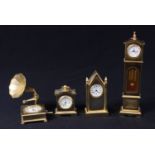 An Everite brass miniature longcase clock, 13cm, a similar brass miniature bracket clock, gramophone