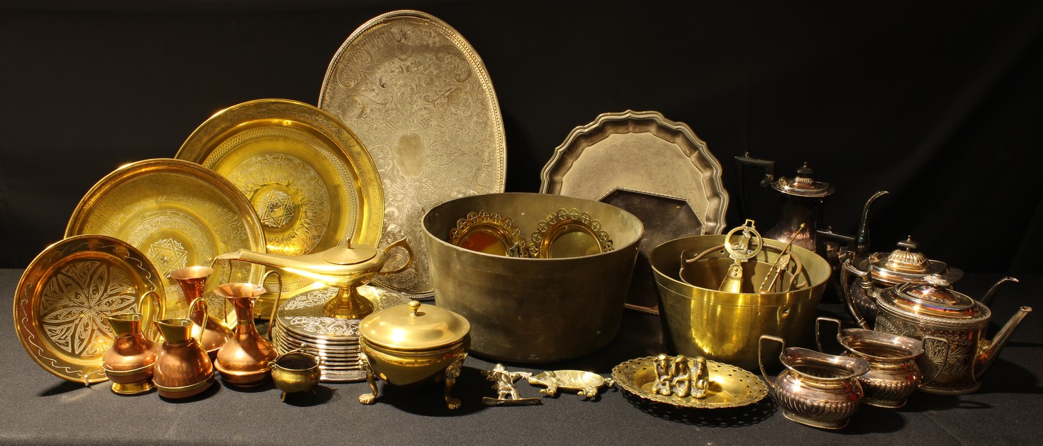 Metalware - an E.P.N.S. four piece tea service; a silver plated gallery tray; Egyptian Revival brass