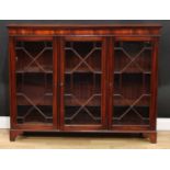 A George III style mahogany astragal glazed low library bookcase, 108cm high, 139cm wide, 30.5cm