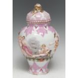 A German porcelain vase, moulded in relief with a procession of scantily clad reveling Classical