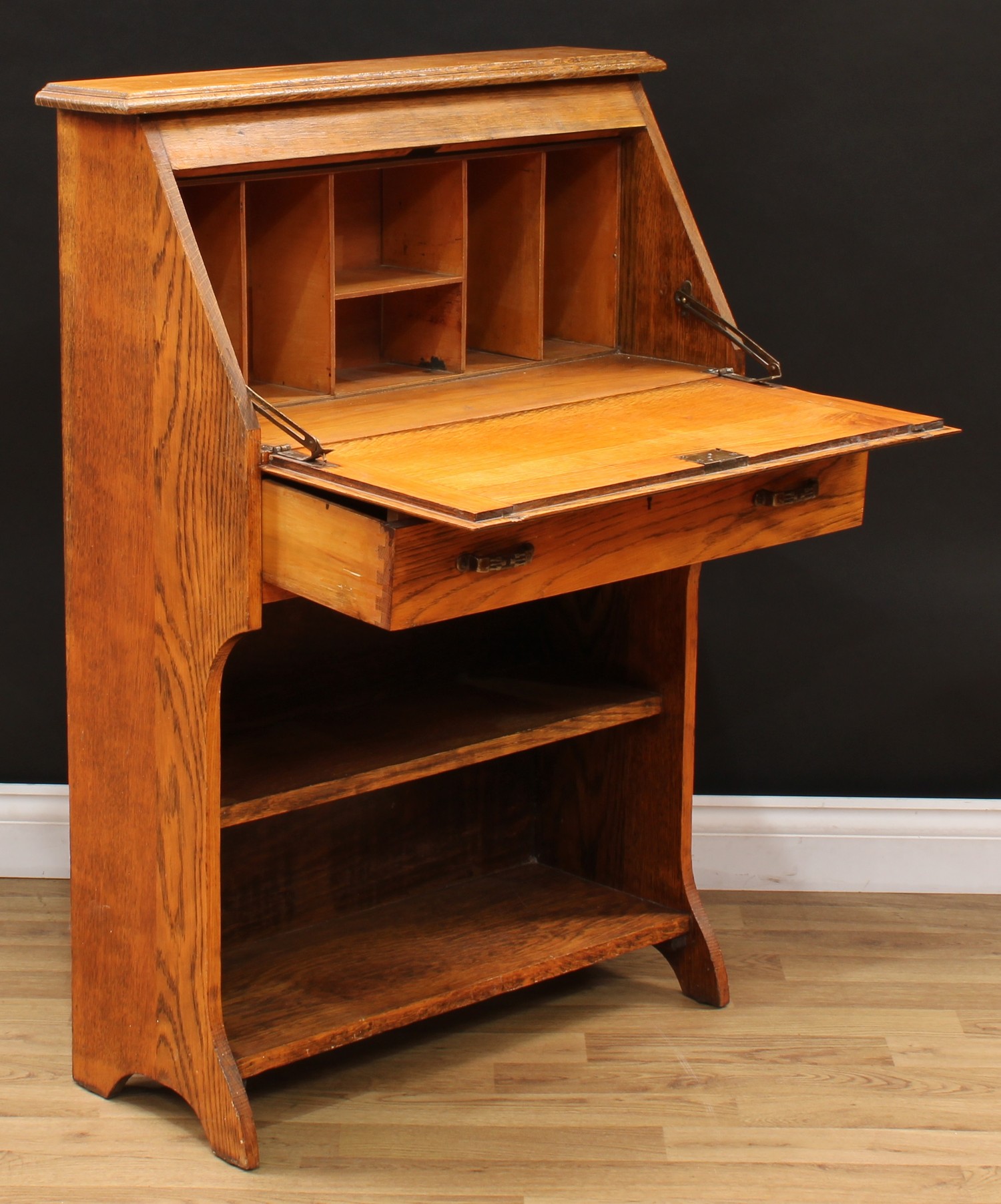 An early 20th century oak student's bureau, fall front enclosing an arrangement of pigeonholes, - Image 3 of 4