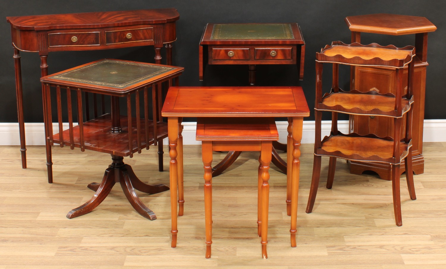 A Regency style dropleaf occasional table; a similar revolving bookcase; three-tier etagere; side