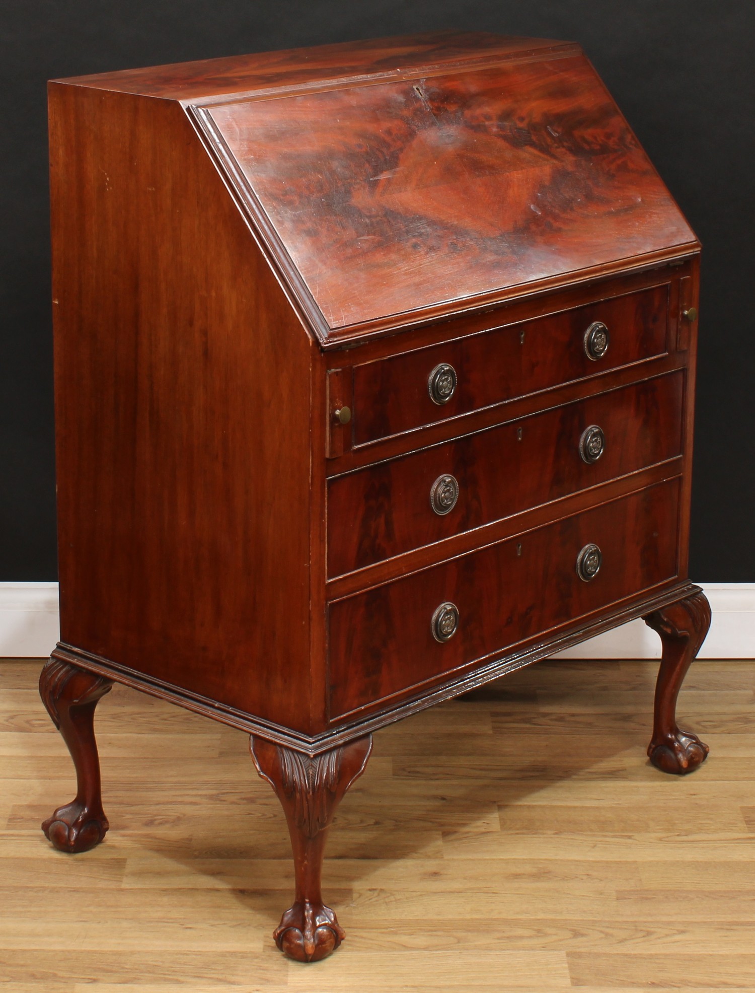 A mahogany bureau, fall front enclosing a fitted interior above three long drawers, 101cm high, 82cm - Image 4 of 9