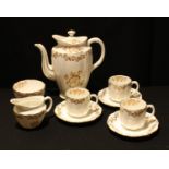 A Royal Crown Derby part coffee service including coffee pot, cream jug, sugar bowl, cups and