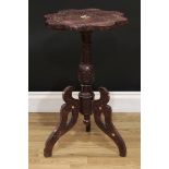 A Middle Eastern tripod occasional table, in the Moorish taste, 65.5cm high, 39.5cm 'diameter'