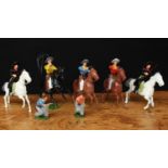 W Britain (Britains) seven painted lead Cowboy figures, various poses including some mounted on