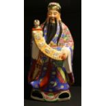 A large Chinese export ware Fu figure, 62cm