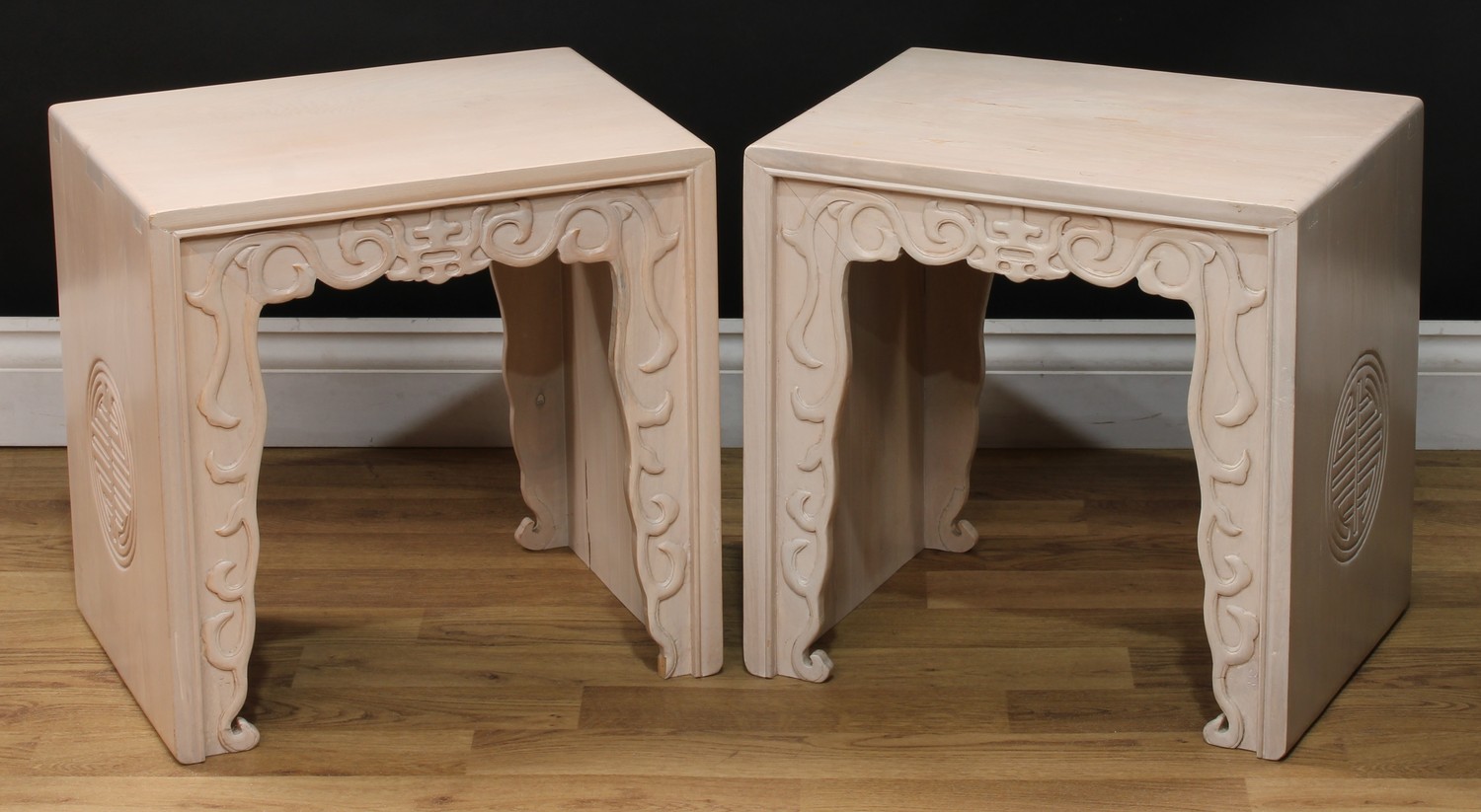 A pair of Chinese inspired tea tables or jardiniere stools, the sides impressed with the double