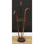A novelty cast metal walking stick or umbrella stand, after the steampunk, 116cm high, 30cm diameter