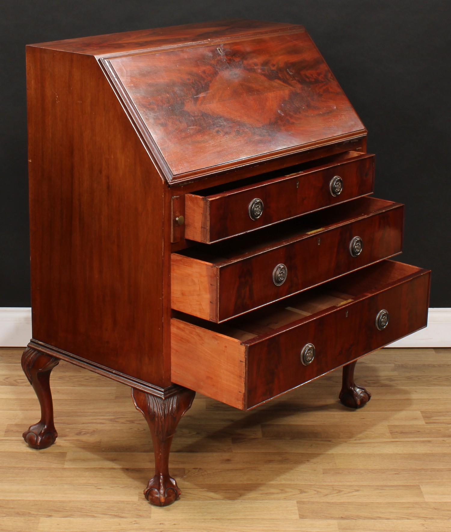 A mahogany bureau, fall front enclosing a fitted interior above three long drawers, 101cm high, 82cm - Image 5 of 9