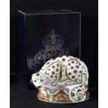 A Royal Crown Derby paperweight, Snow Leopard, gold stopper, 17cm wide, printed mark, signed in