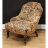 A Victorian low club or drawing room chair, shaped button back, serpentine seat, turned forelegs,