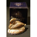 A Royal Crown Derby paperweight, Golden Jubilee Black Swan, limited edition 1069/2,002, gold