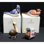 A Royal Crown Derby paperweight, Blue Jay, silver stopper, boxed; others, Pheasant, no stopper,