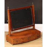 A 19th century mahogany dressing mirror, rectangular plate, bow front base with three small drawers,