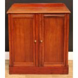 A late Victorian mahogany enclosed bookcase, moulded rectangular top with half gallery above a
