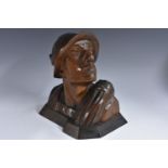 A German Third Reich period carved softwood bust, of Anderl Heckmair, the first man to climb the