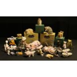 A set of three Harmony Kingdom resin models of cats, boxed; two Country Artists cat models, boxed;