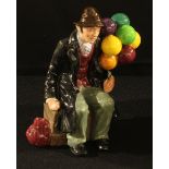 A Royal Doulton figure, The Balloon Man, 17.5cm tall.