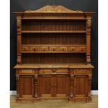 A large pine farmhouse dresser, 225cm high, 188cm wide, 52.5cm deep