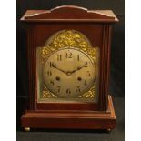 A late 19th century mahogany bracket clock, silver dial inscribed with Arabic numerals and applied