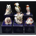 A Royal Crown Derby paperweight, Beaver, silver stopper, boxed; others, Tortoise, Panda, Puffin,