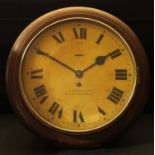 Police Station Wall Clock by TA Henn & Son, Wolverhampton. Circular dial with Roman numerals alomg