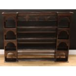 A George III oak dresser shelf or 'Delft' plate rack, 106cm high, 142cm wide, 21.5cm deep