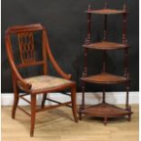 An Edwardian mahogany salon chair, outlined with satinwood crossbanding and boxwood and ebony