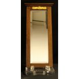 An Arts and Crafts oak framed wall mirror of small proportions, 52.5cm x 24cm.