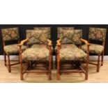 A set of six Cromwellian Revival oak dining chairs, comprising a pair of carvers and six side