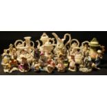 A collection Capo-di-Monte figures, floral jugs and teapots; etc
